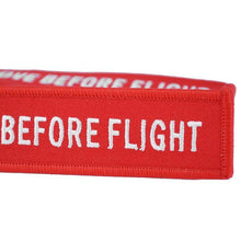 Load image into Gallery viewer, REMOVE BEFORE FLIGHT Key chain