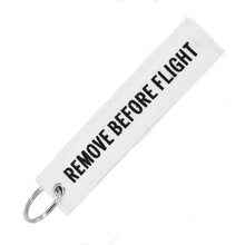 Load image into Gallery viewer, REMOVE BEFORE FLIGHT Key chain
